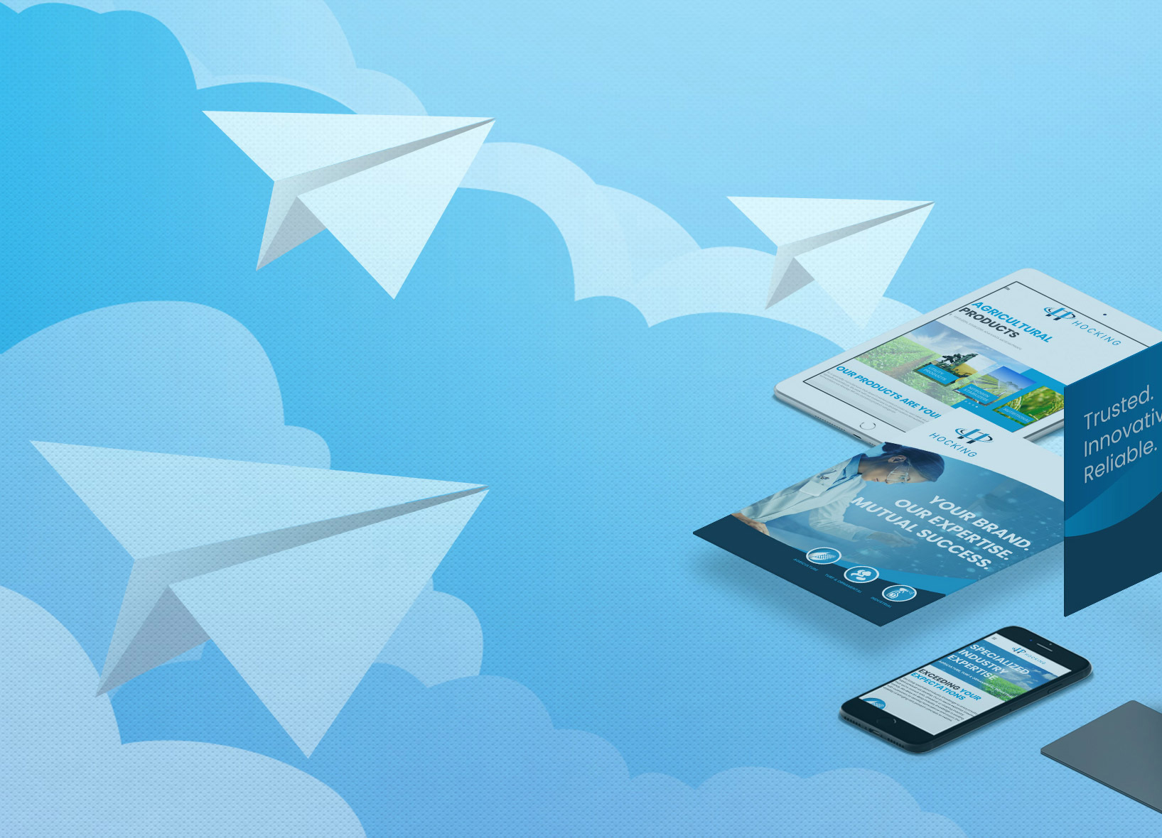 Marketing website and print materials shown on laptop, tablet and phone